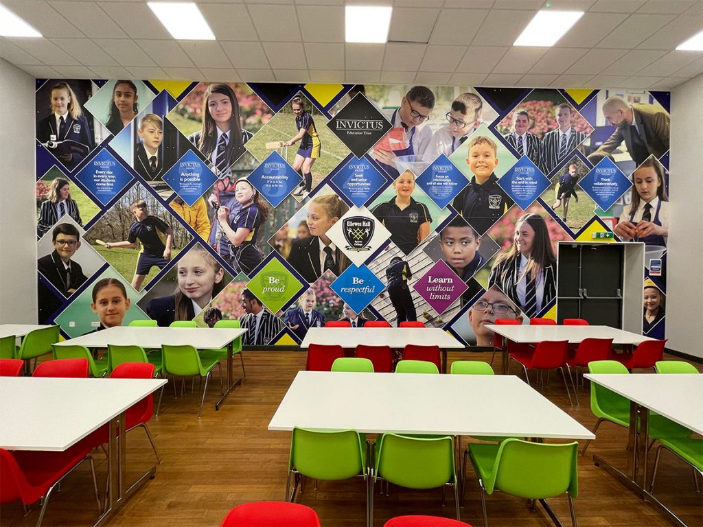 multiple pictures of students in a square pattern using green,blue and purple and in the centre saying invictus school